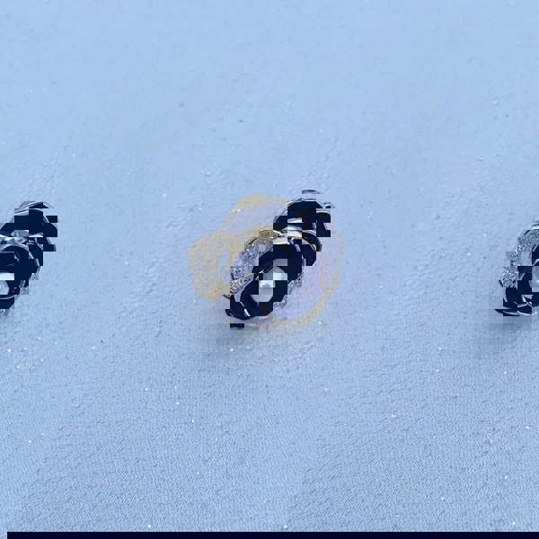 Rose brooch, small pin design, black enamel petals, gold tone detailing, central pearl accent, diamanté trim, vintage inspired style, elegant decorative accessory
