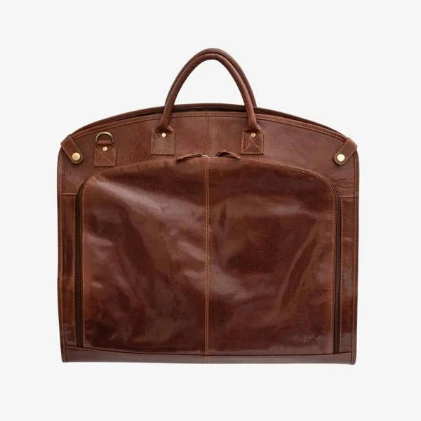 Cognac leather garment carrier on a white background