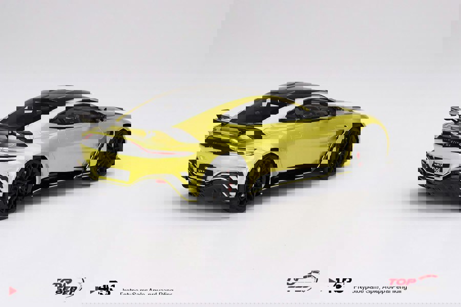 TSM Aston Martin V12 Vantage Cosmopolitian Yellow 1:18 Scale TSM TS0453