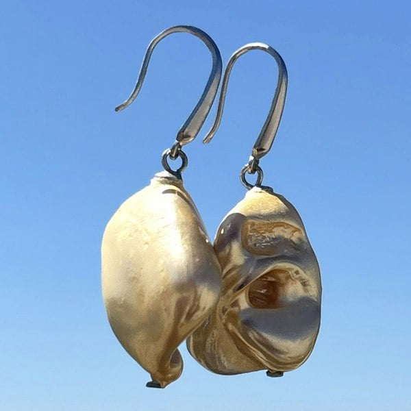 Beach shell earrings featuring natural shell in gold colour, handcrafted by LENAE.