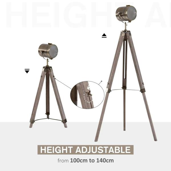 Height-adjustable industrial tripod floor lamp with bronze searchlight head and grey legs