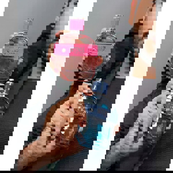 Sapil Intense Women Eau de Parfum 100ml held by man