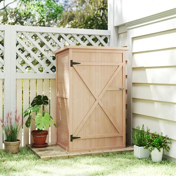 Natural wood outdoor storage shed with closed X-braced door and metal latch