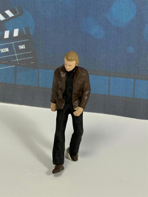 a small toy figure of a man