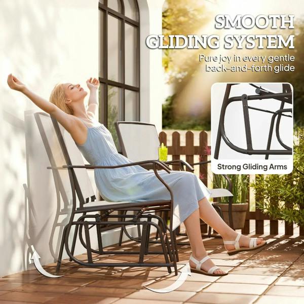 Beige-cushioned gliding lounge chair with dark frame and curved arms