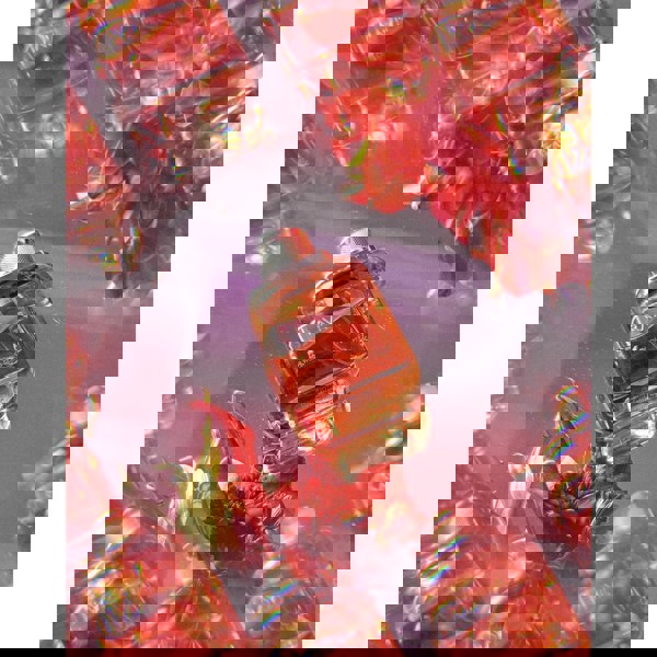 Rave Women Eau de Parfum bottle with reflective gems