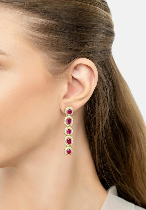 The earring worn by a model.