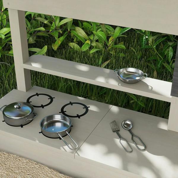 Kids sandbox kitchen counter with stove burners and pots and pans