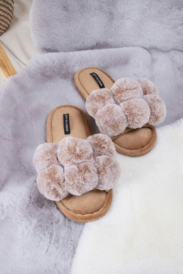 Dolly women's slider slippers in caramel with oversized faux fur pom poms from Pretty You London