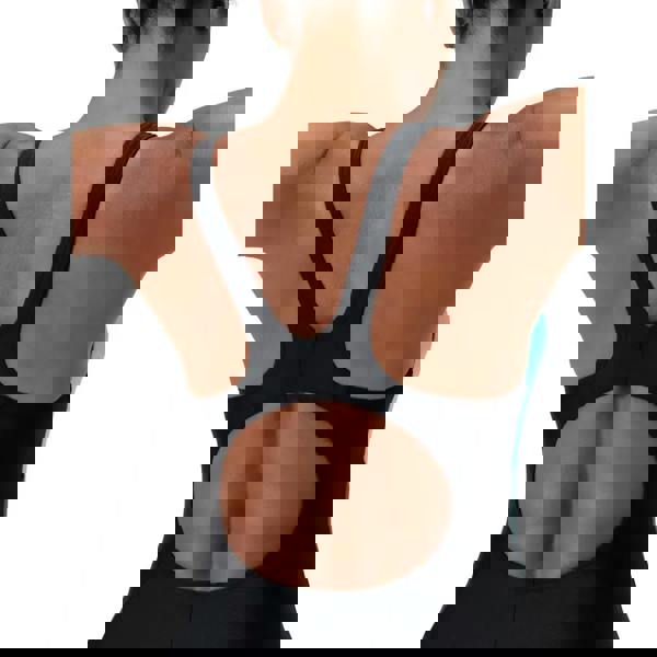 Speedo black racerback sports bra with cutout, green accents, muscleback design