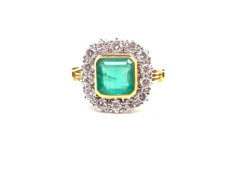 vintage emerald and diamond cluster ring