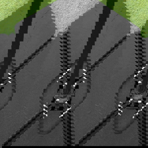 Black cantilever parasol square base with interlocking black slabs, featuring a sturdy central pole and metal securing brackets