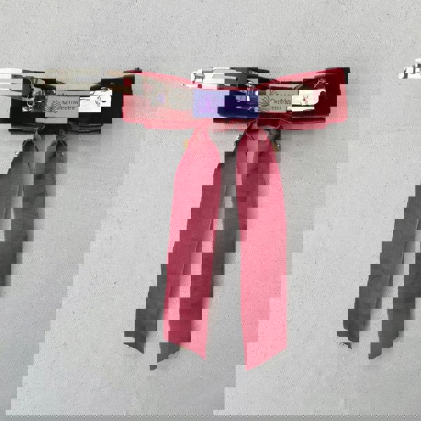 Red velvet bow hair clip, long ribbon tails, secure metal barrette clasp, soft luxurious fabric finish, classic vintage inspired design, elegant decorative hair accessory, gift for her
