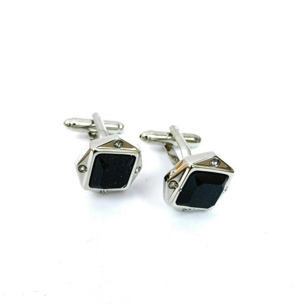 Black glitter gemstone cufflinks by PAMONI featuring polished metal and sparkling gemstone accents for formal attire.