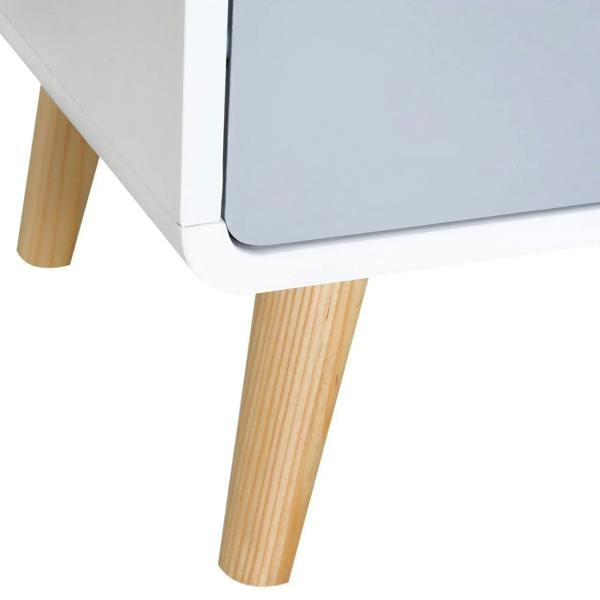 Close-up of white nightstand legs in light natural wood