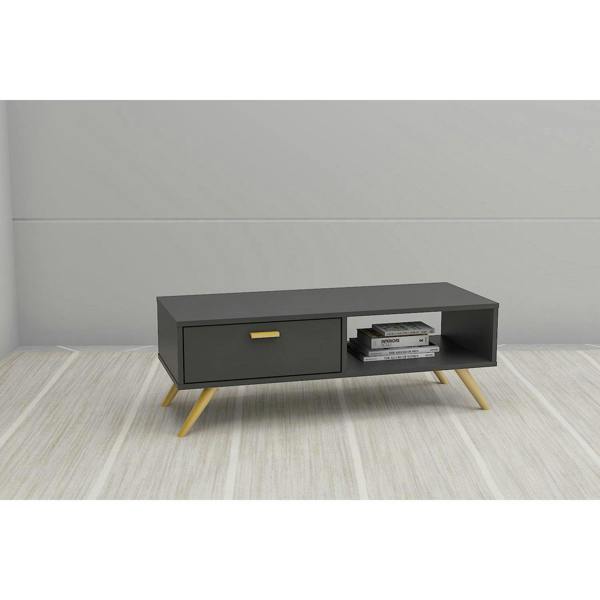 Coffee table in a modernly decorated living room. It shows the 1 left-handed cupboard, right side open back niche and top surface area in use.