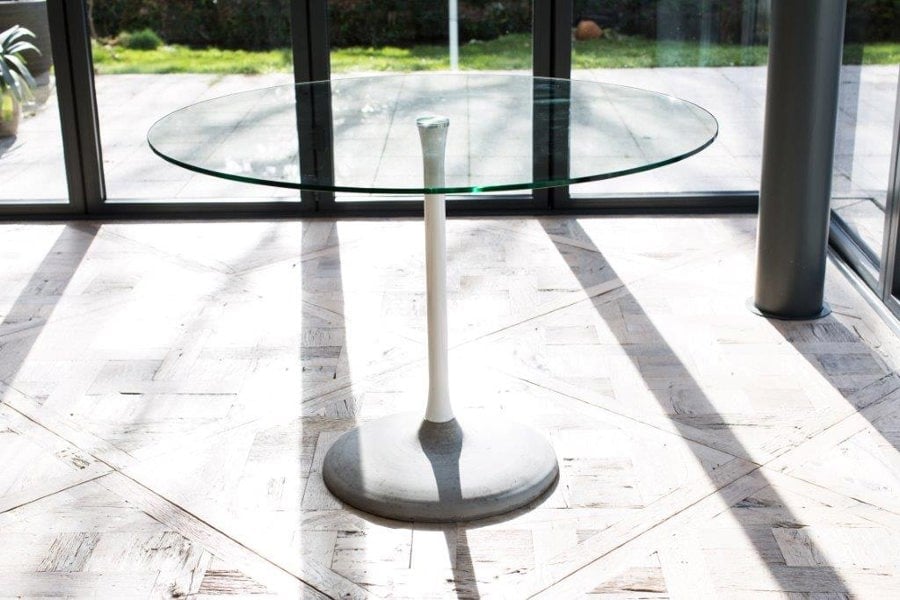 SWAN Dining Tables with a concrete base by Gillmore British Design