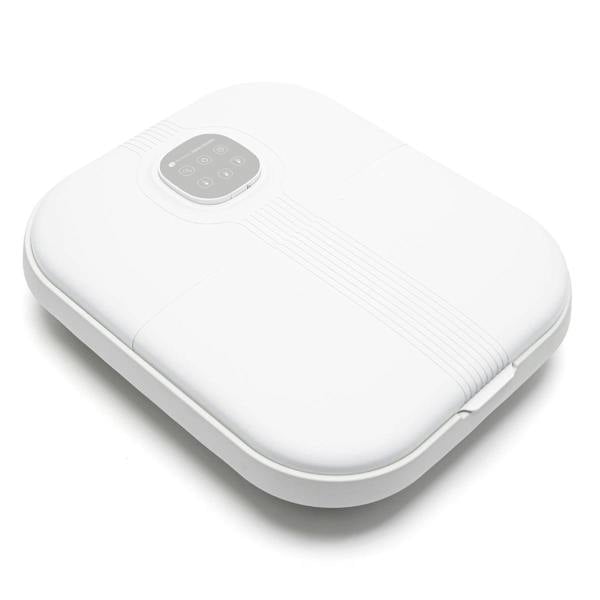 The Rio Deluxe Foldaway Foot Spa Bath is a white, rectangular device with rounded edges, a small touchscreen control panel on top, and subtle textured lines. The luxurious spa is shown closed and resting on a white background.
