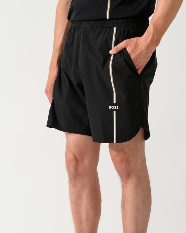 close up shot of a model wearing a BOSS Green TOC Mens Active Tennis Shorts in Innovative NOVA Fabric in Black 001