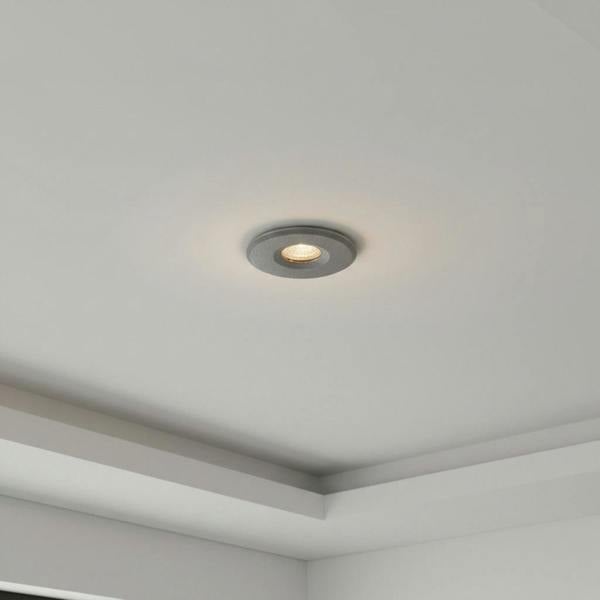 grey mini ceiling spotlight installed in a modern home