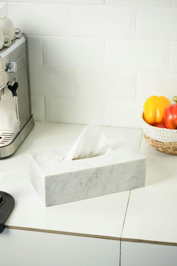 carrara marble tissue holder on kitchen counter 