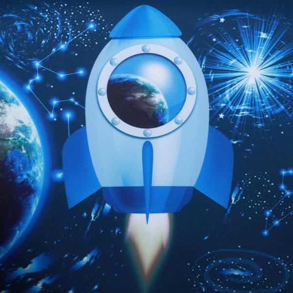 Close-up of blue rocket space graphic on the backrest of a kids armchair