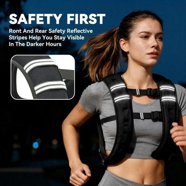 Black weighted vest with reflective stripes and secure harness fit over a gray tank
