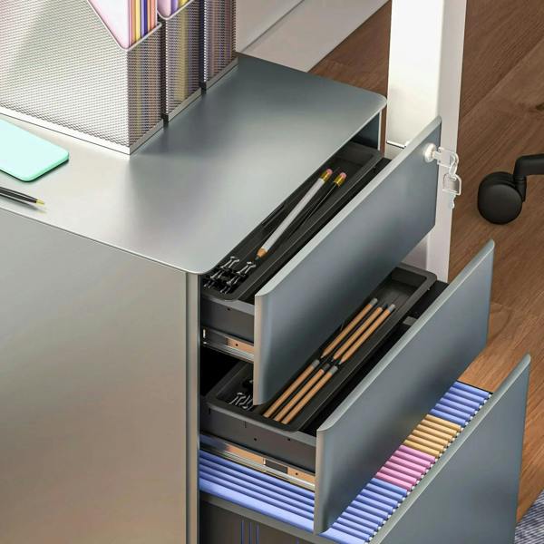 Grey 3-drawer filing cabinet with drawers open, showing hanging file rails and organizer space