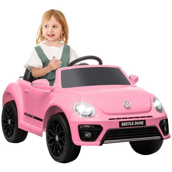 Pink kids ride-on Beetle car with LED headlights, black grille, and steering wheel