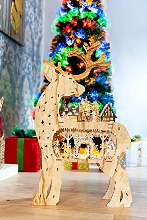 Shatchi 69cm Brown Wooden Laser Cut Reindeer Light with Village Scene and Warm White LEDs