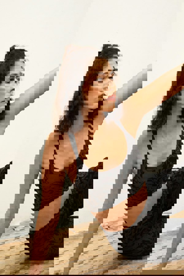 Black grey charcoal recycled seamless marble print low to medium impact supportive sports bra for yoga, pilates, spinning, weights, running and exercise.