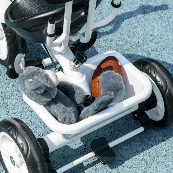 Kids tricycle seat close-up with orange harness buckle and padded support