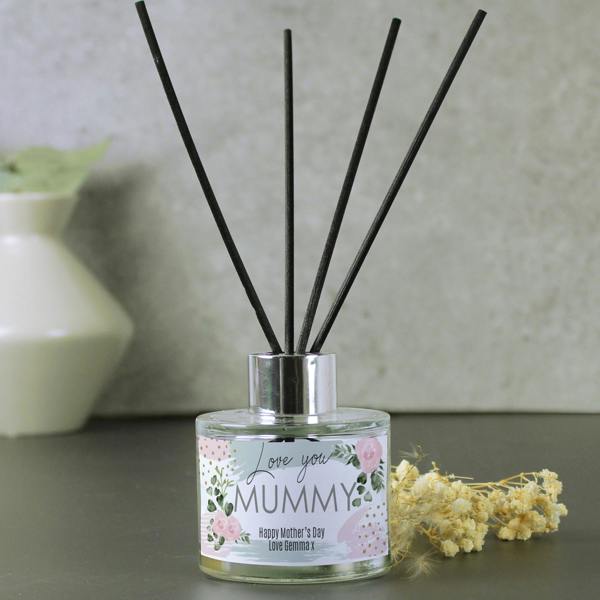 Mother's Day gift idea showing a personalised Mummy rose-themed reed diffuser.