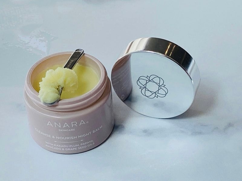 Anara Cleanse & Nourish Night Balm with a scoop of the balm