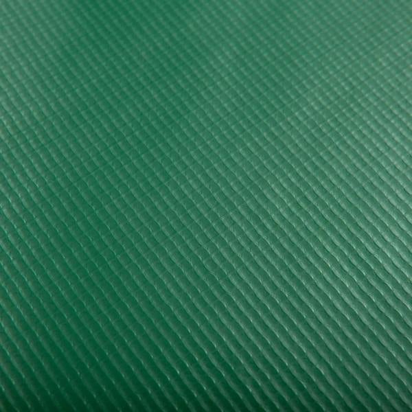 Green textured trampoline safety pad surface, close-up of durable weave