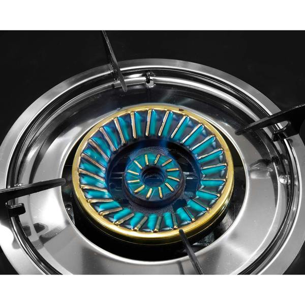 Close-up of a gas stove burner with blue stable flame