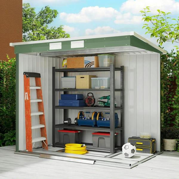 Green galvanised steel garden shed interior with shelves and stacked tools