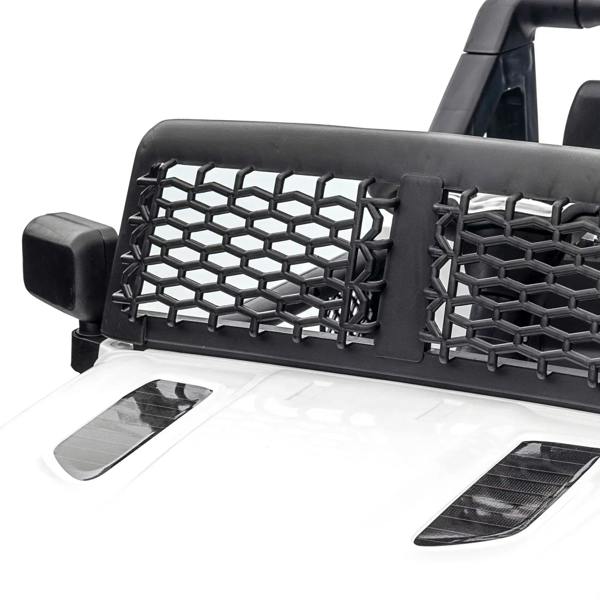 White ride-on SUV side panel with mesh cover and molded foot pedals