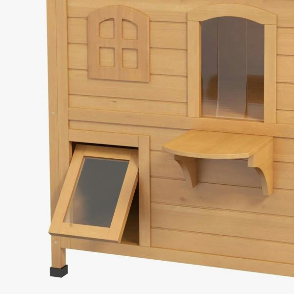 Outdoor wooden cat house close-up of arched windows, side opening, and small front step platform