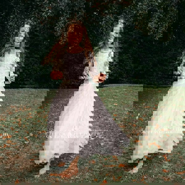 Happy girl in flower girl clothing