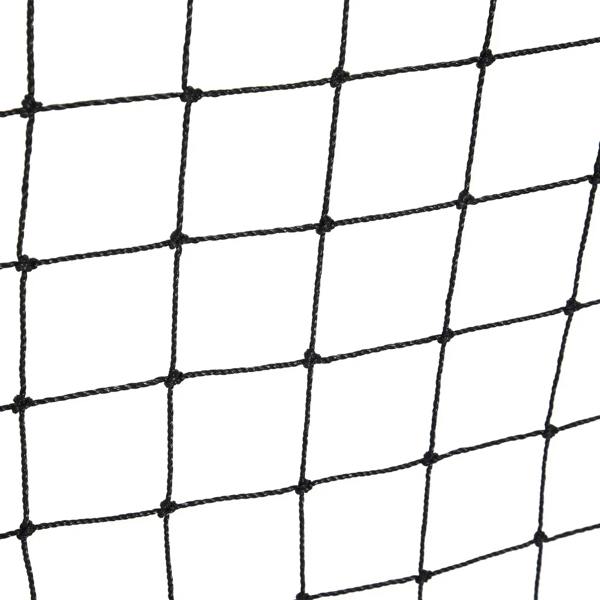 Close-up of black net grid on a red rebound kickback goal rebounder