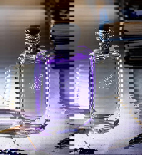 Hawas Eau De Parfum 100ml by Rasasi banner lifestyle on table