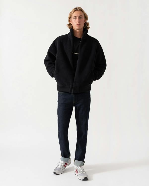 Outfit shot of the BOSS Green Mens  Logo-embroidered zip-up sweatshirt in teddy fleece - Black 001