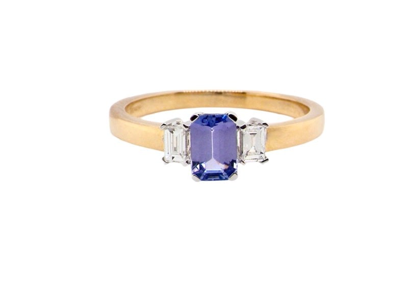 A Tanzanite and Diamond three stone ring