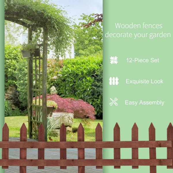 Rustic brown wooden border fence with pointed pickets for garden edging