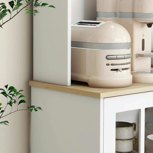 White kitchen cupboard with countertop and open cabinet shelf space