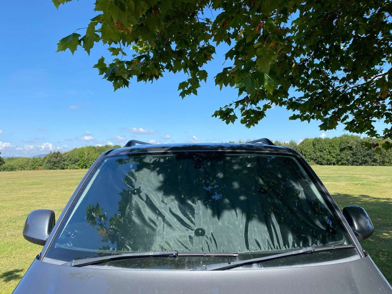 An image from the front and outside of the Internal Blackout Insulated Blind Set for VW T5/T6 Campervans from OLPRO