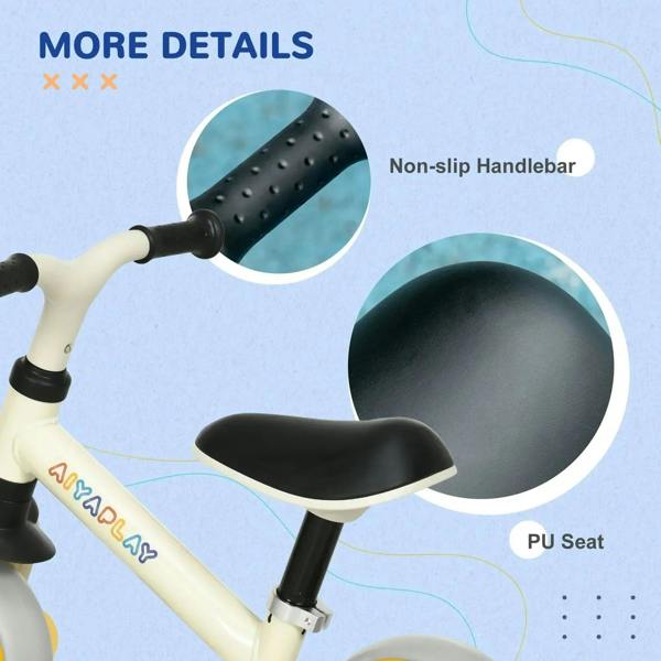 Children's balance bike details: textured non-slip handlebar and black seat