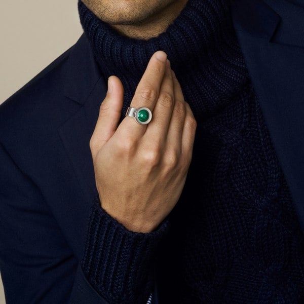 model wearing malachite ring in sterling silver