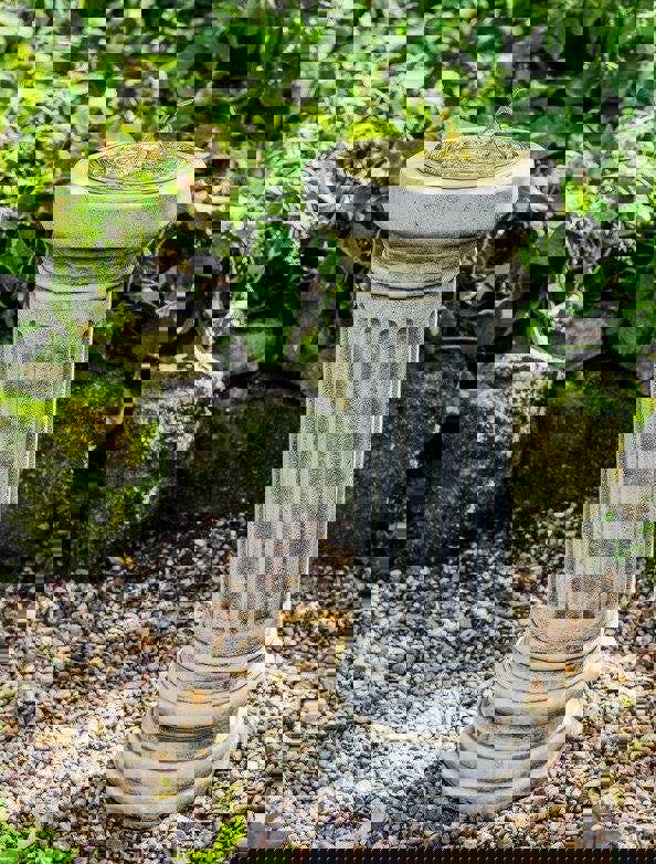 Large Sundial On Classic Stone Column